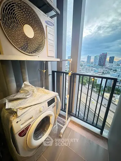 Modern balcony with washing machine and city view, perfect for urban living.