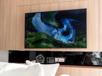 Modern living room with wall-mounted TV and elegant wooden paneling