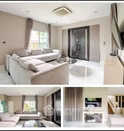 Spacious modern living room with elegant decor and large windows for natural light.