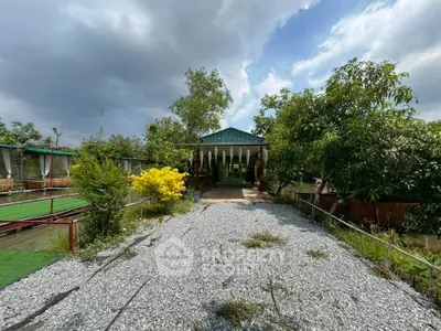 Charming rural property with lush greenery and serene surroundings, perfect for nature lovers seeking tranquility.