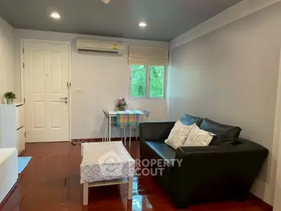 Cozy living room with modern decor and natural light