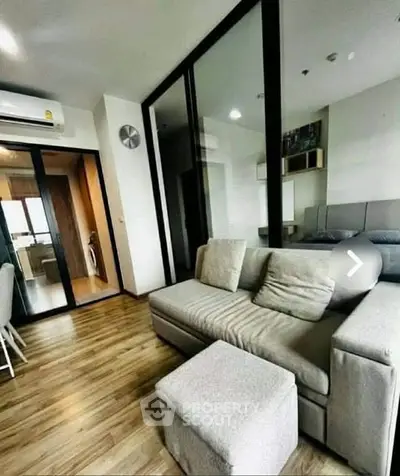 Modern living room with stylish decor and open layout in a contemporary apartment.