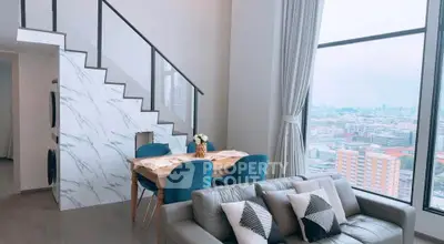 Luxurious modern living room with stunning city view and elegant decor