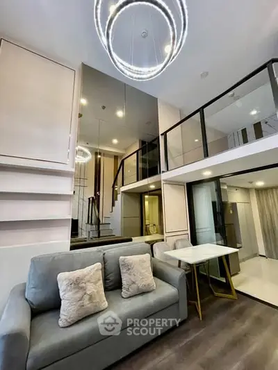 Modern loft apartment with stylish lighting and open layout