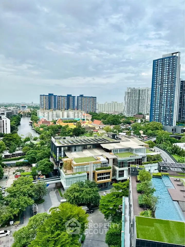 Stunning cityscape view with modern high-rise buildings and lush greenery