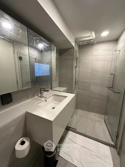 Modern bathroom with sleek design and spacious shower area