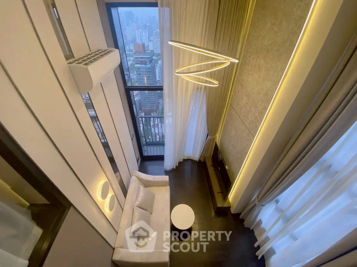 Luxurious high-rise living room with stunning city view and modern lighting