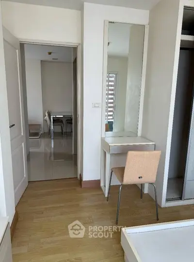 Modern apartment interior with wooden flooring and stylish furniture