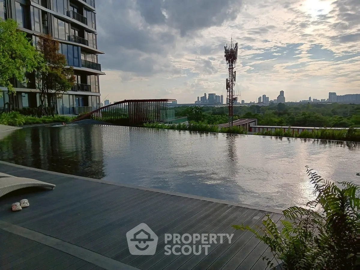 Luxurious rooftop infinity pool with stunning city skyline view