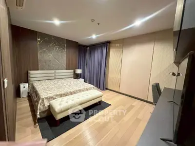 Luxurious modern bedroom with elegant decor and ambient lighting