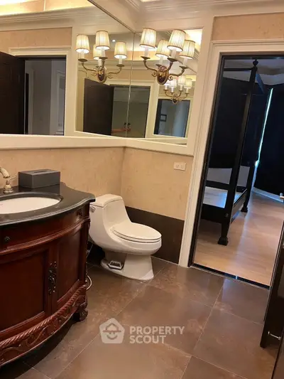 Luxurious bathroom with elegant vanity and modern fixtures in upscale home