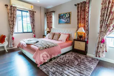 Luxurious bedroom with elegant decor and plush furnishings