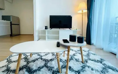 Modern living room with stylish furniture and entertainment setup