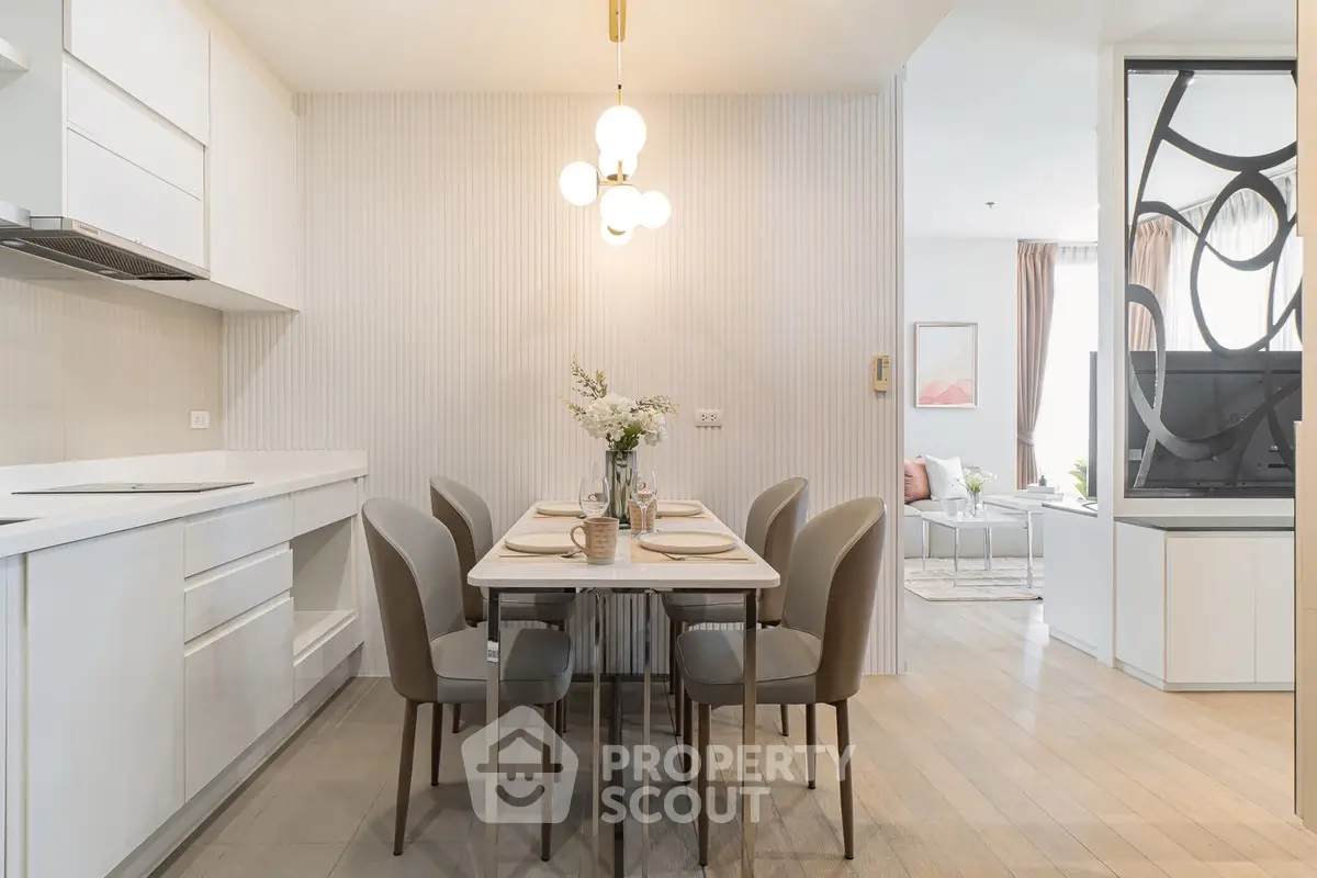 Modern dining area with elegant decor and open layout in a stylish apartment