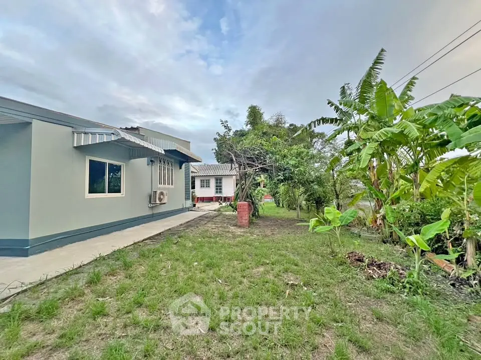 Charming suburban home with spacious garden and lush greenery, perfect for family living.