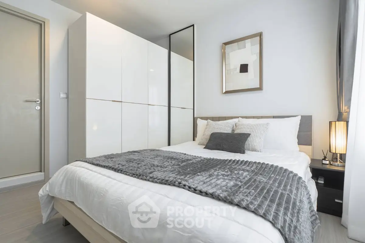 Modern bedroom with stylish decor and cozy ambiance