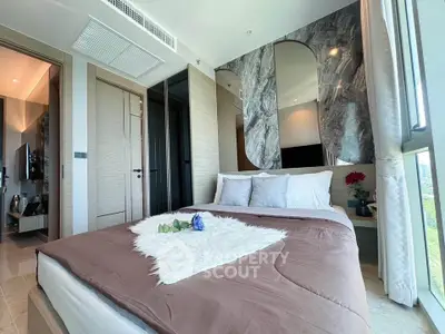 Luxurious bedroom with modern decor and stunning city view