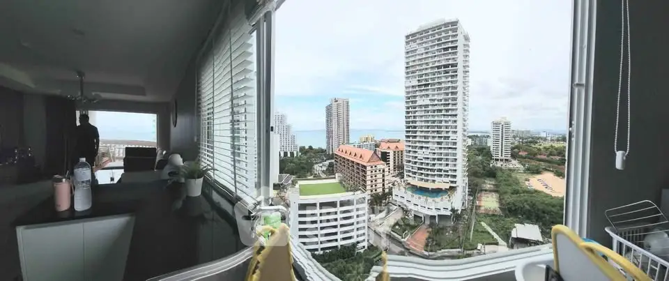 Panoramic city view from modern apartment with large windows