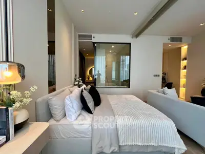 Luxurious modern bedroom with elegant decor and large window view