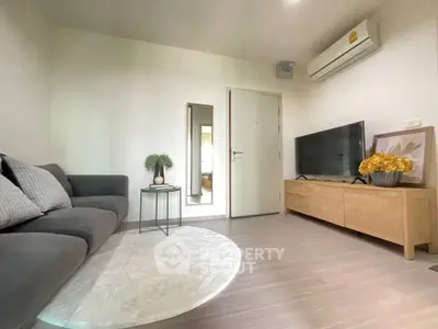 Modern living room with sleek furniture and stylish decor