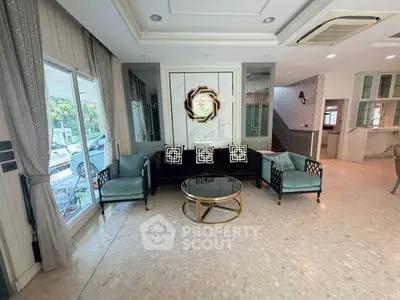 Luxurious living room with elegant decor and large windows in a modern home