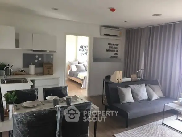 Modern open-plan living room with dining area and stylish decor