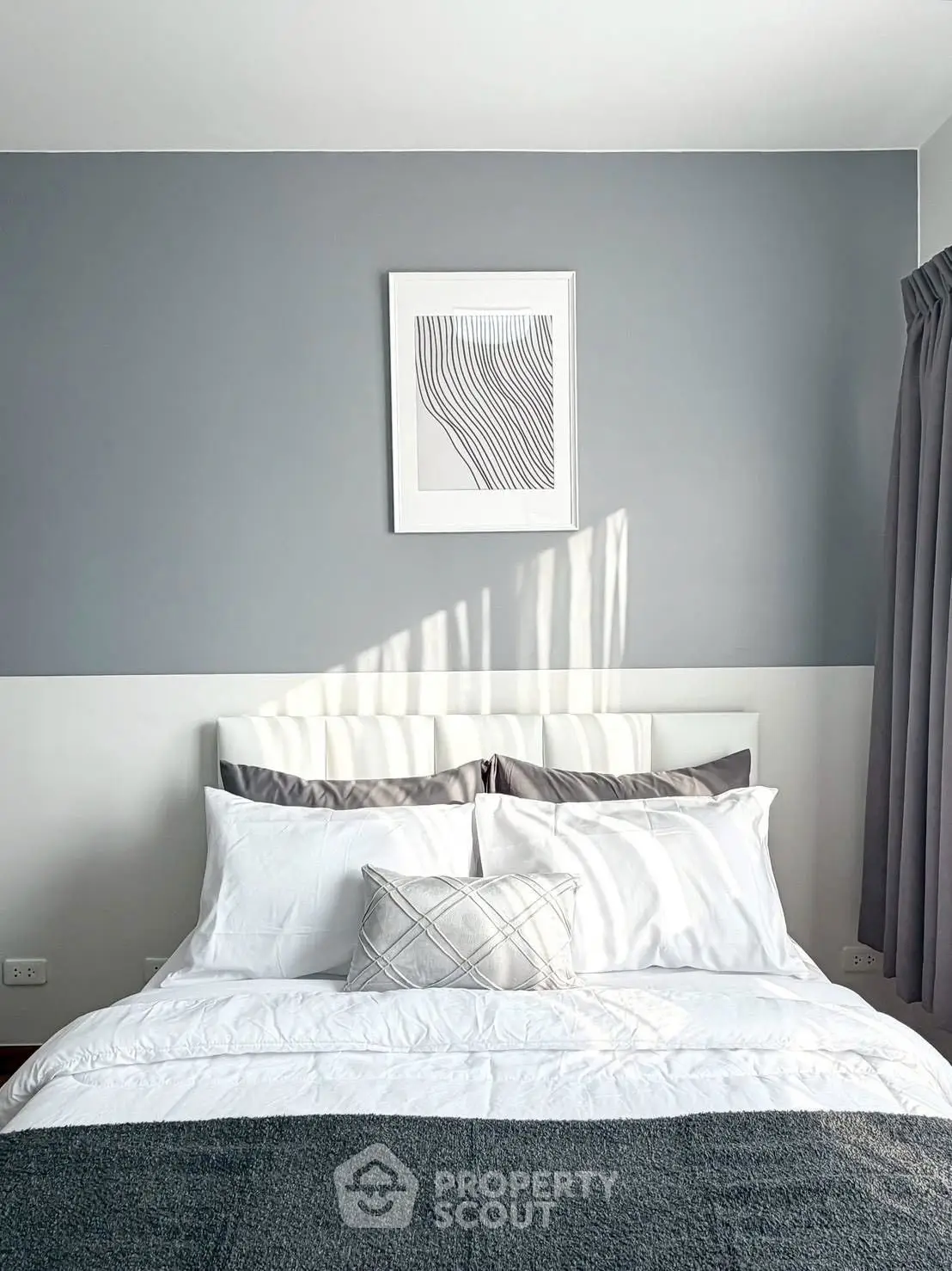 Cozy bedroom with modern decor and natural light