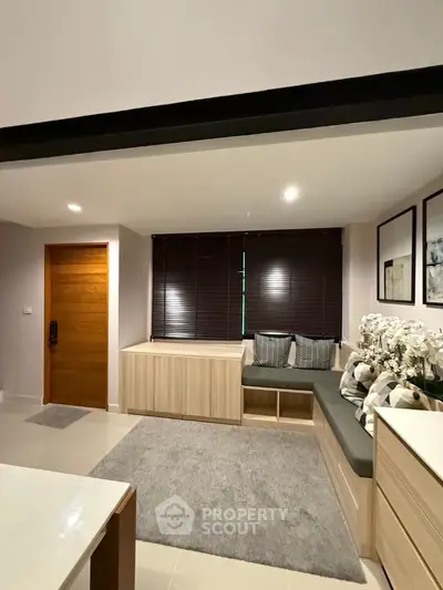 Modern living room with cozy seating and stylish decor