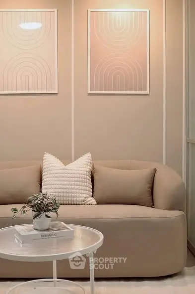 Stylish modern living room with beige sofa and elegant decor