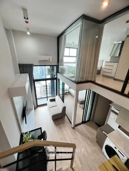 Modern duplex apartment with open layout and stylish furnishings