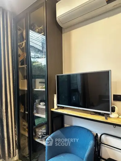 Modern living room with sleek TV setup and stylish shelving unit