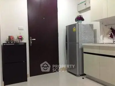 Modern kitchen with sleek fridge and stylish decor