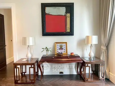 Elegant living room with stylish furniture and modern art, perfect for sophisticated home decor.