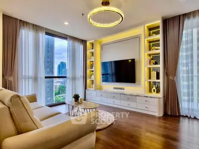 Luxurious modern living room with large windows and elegant decor in a high-rise apartment.