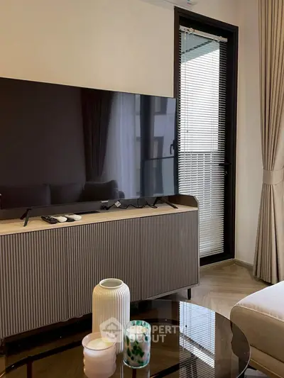 Modern living room with sleek TV setup and elegant decor