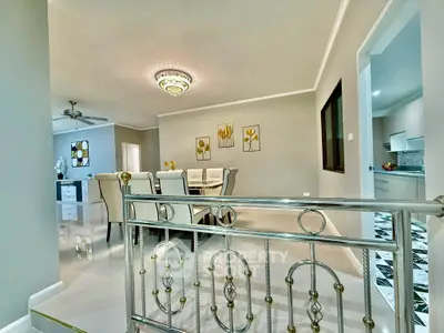 Elegant dining area with modern decor and open layout in a luxurious home interior.