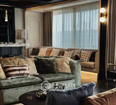 Luxurious living room with plush sofas and elegant decor, perfect for modern living.