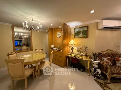 Elegant living room with classic furniture and chandelier lighting