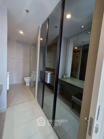 Modern bathroom with sleek design and glass shower enclosure