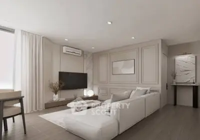 Elegant modern living room with neutral tones, stylish furniture, and a wall-mounted TV for a cozy ambiance.