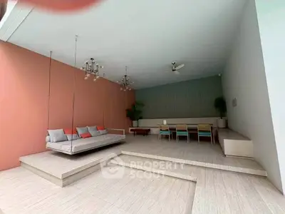 Modern living space with stylish seating and elegant lighting, perfect for relaxation and entertaining.