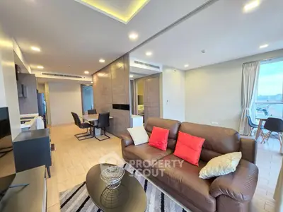 Spacious modern living room with stylish decor and open layout, perfect for relaxation and entertainment.