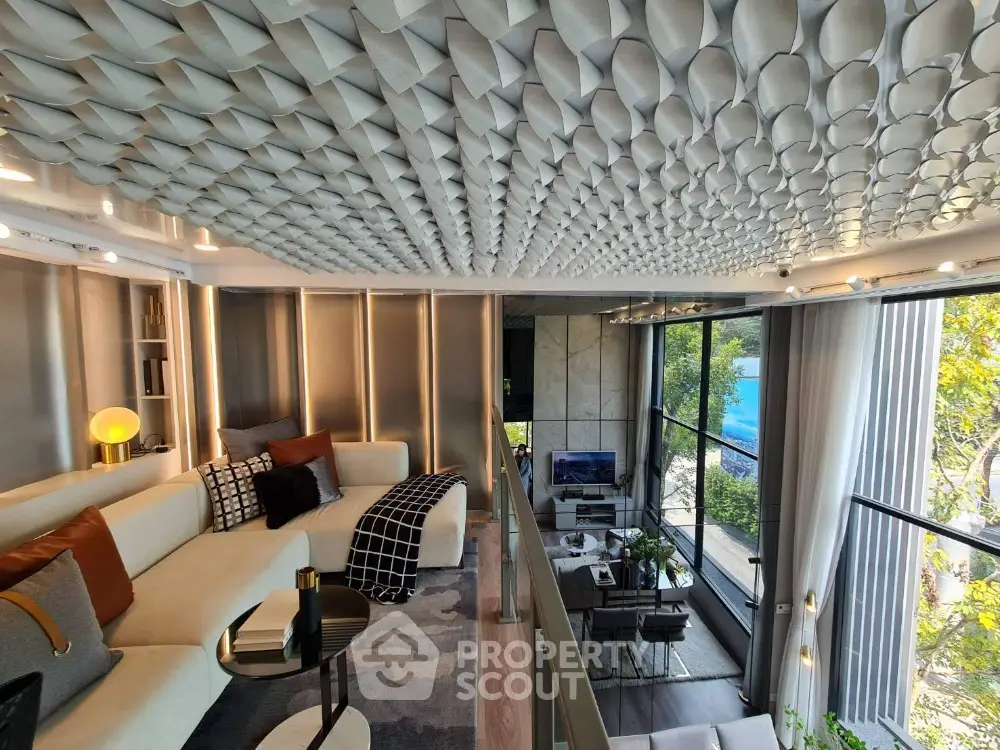 Luxurious modern living room with unique ceiling design and stunning view