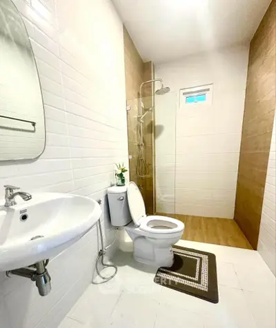 Modern bathroom with sleek fixtures and walk-in shower