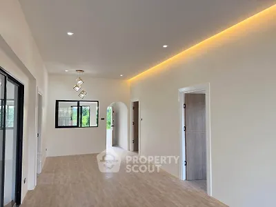 Spacious modern interior with elegant lighting and open layout