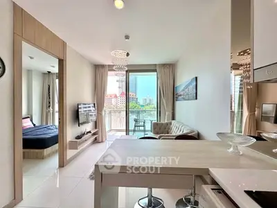 Modern open-plan living room with balcony view in a stylish apartment