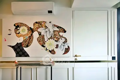 Stylish interior wall art with modern air conditioning unit in a chic living space.