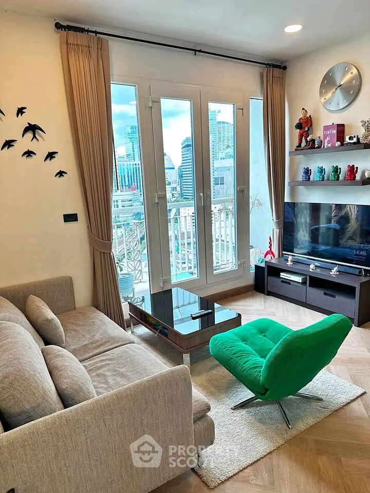Stylish living room with modern decor and city view, featuring a vibrant green chair and elegant wall art.