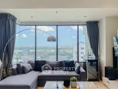 Luxurious living room with panoramic city view and modern decor