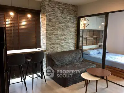 Modern studio apartment with stylish decor and cozy furnishings